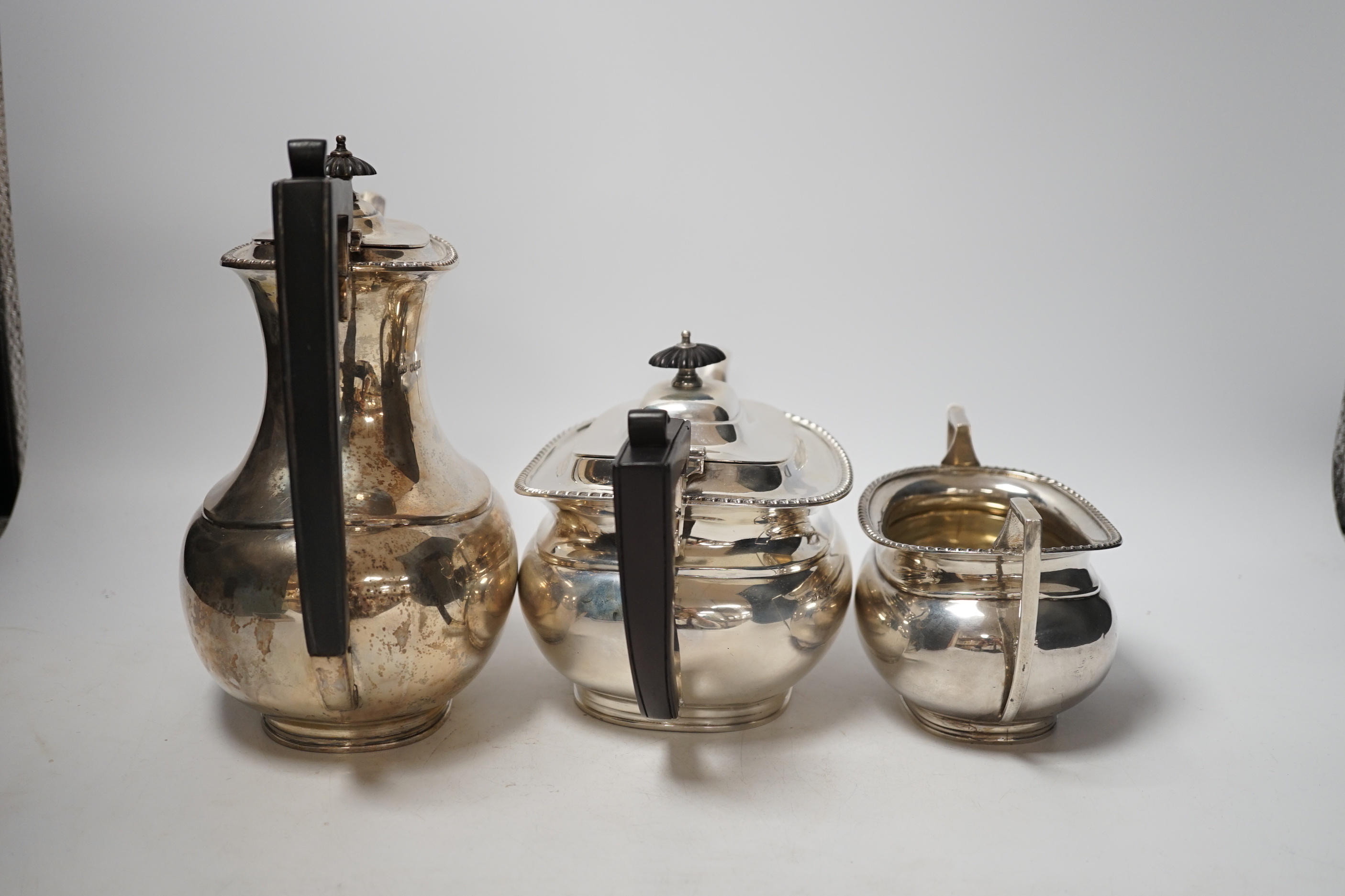 A George V silver coffee pot, teapot and sugar bowl, Fordham & Fordham, Sheffield, 1923. gross weight 59.8oz.